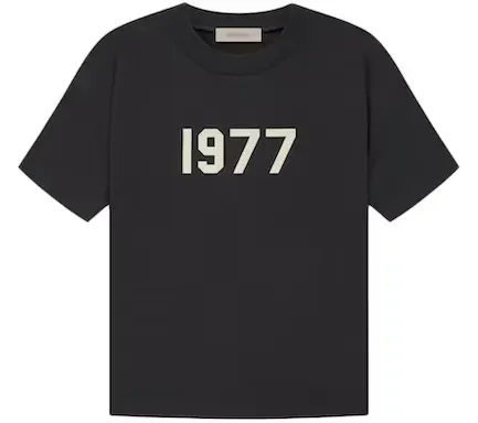 This Iron-colored Fear of God Essentials 1977 T-shirt was released in March of 2022 as a part of Fear of God Essentials’ Spring/Summer 2022 collection.