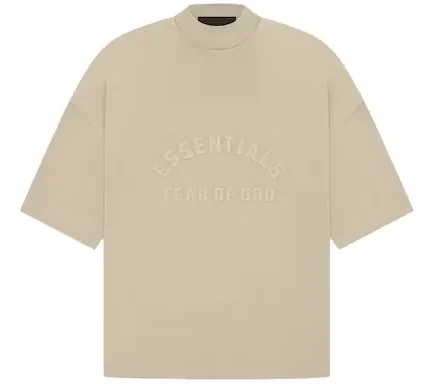 The Essentials tee shirt has been redesigned with increased volume in the body and sleeves, providing additional drape and comfort. A revised rib-knit collar sits higher on the neckline, adding structured formality.