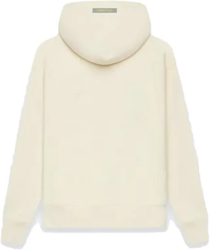 Here we have the Fear of God Essentials Kids Pull-Over Hoodie in Buttercream. This Fear of God Essentials Kids Pull-Over Hoodie features a kangaroo pocket and dropped shoulders.